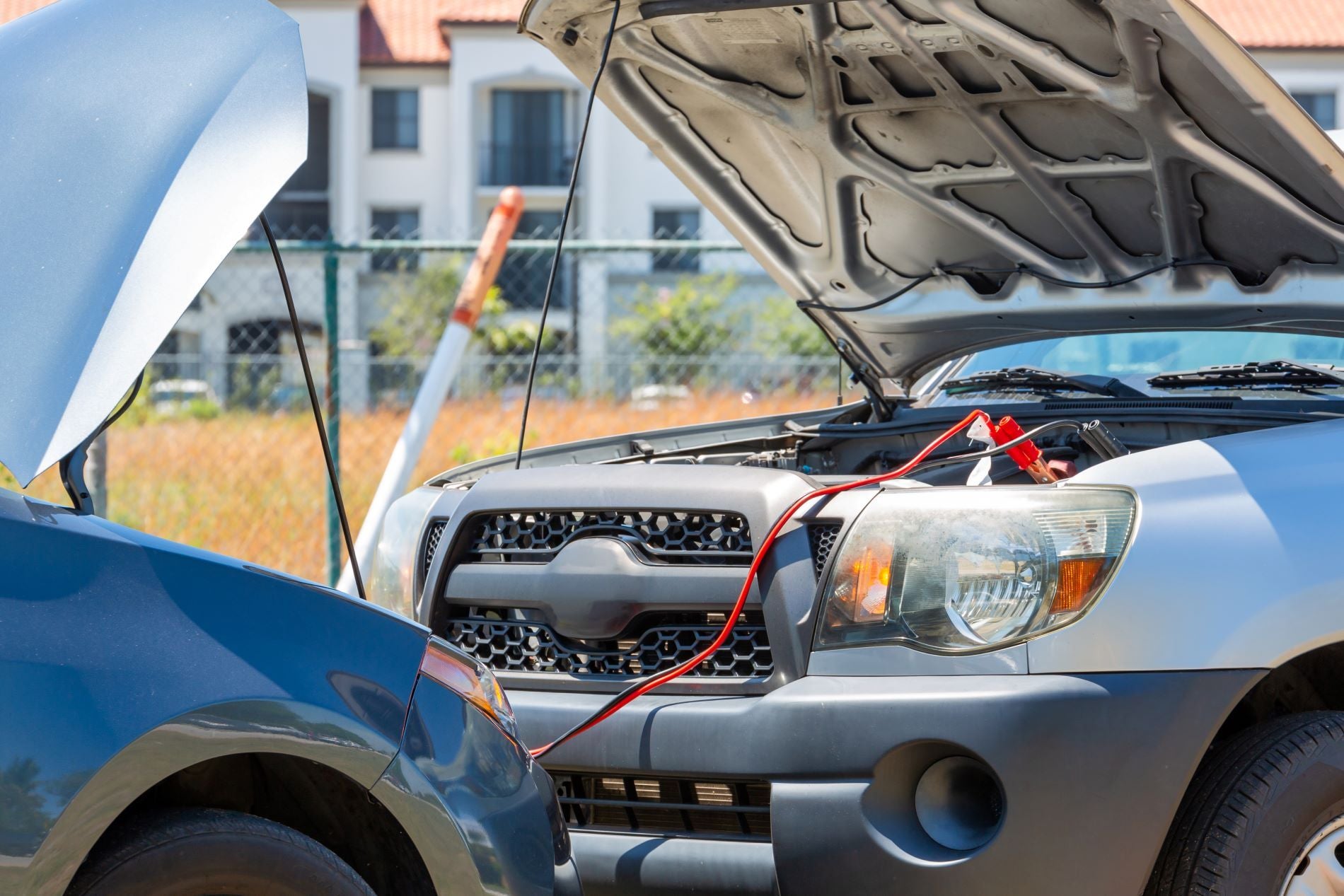 A demonstration of how to jump start a car, One must connect to the dead car battery connecting to a dead battery's positive terminal and negative terminal. 